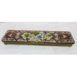 19th century tapestry upholstered long footstool on a mahogany base with four bun feet, 26 x 110cm