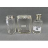 Three silver topped glass jars, Birmingham 1905 / 06, tallest 10cm, (3)