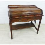 Early 20th century oak roll top desk, with tambour front opening to reveal a fitted interior, over