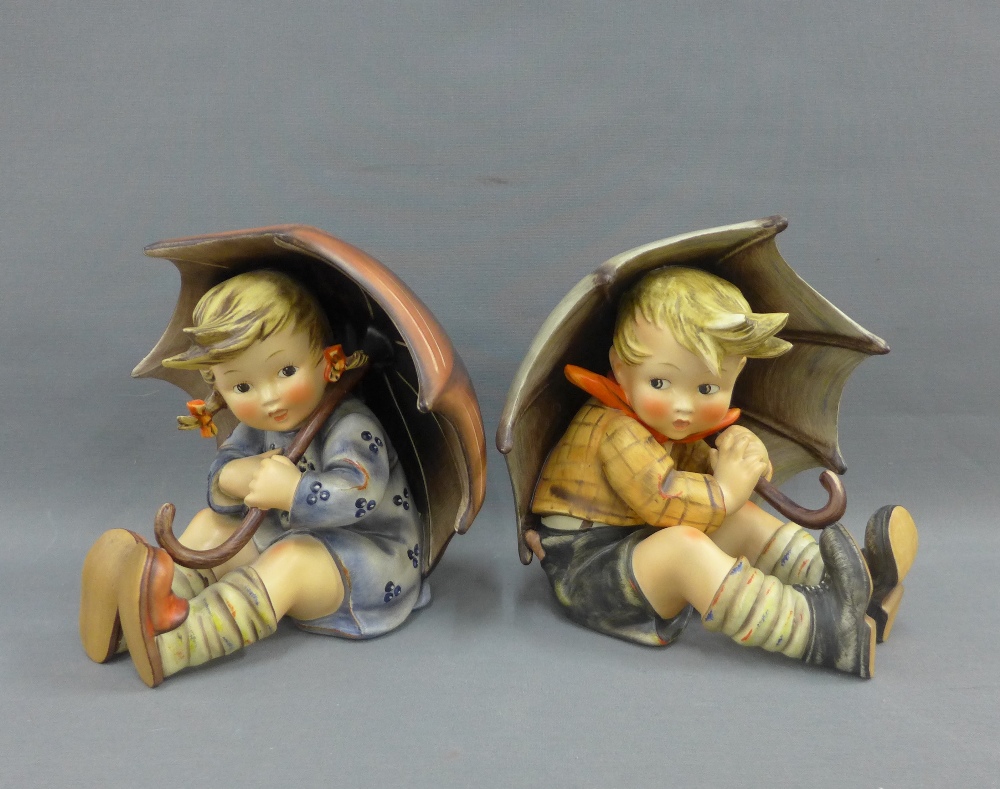 Umbrella Girl and Umbrella Boy, a pair of oversized Goebel Hummel figures, 20cm high (2)