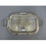 Eastern silver tray, with handles to side and stylised panels, stamped Thailand Sterling, 56 x 32cm