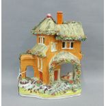 Staffordshire pottery house, 25cm high