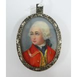 Portrait miniature on ivory of a Gentlemen wearing a military jacket, contained within a white metal