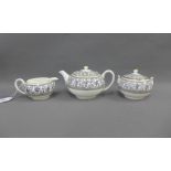 Wedgwood Florentine pattern black and white teapot, sugar jug and cream jug (3)