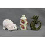 Pink and white glazed pottery pink, green glazed seahorse jug and a foot warmer (3)