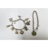 Silver charm bracelet and a watch chain (2)