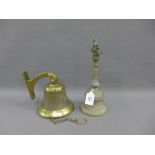 Indian bell with Ganesh finial, 28cm high together with a brass bell (2)