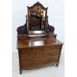 Mahogany dressing table / chest, with a rectangular swing mirror flanked by two jewel drawers,