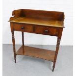 Victorian mahogany washstand, with three quarter ledgeback, single frieze drawer, ring turned legs