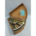 A sextant by Kidd, of Dock Street, Dundee, contained within a mahognay case,