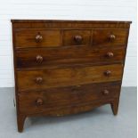 19th century mahogany chest, the rectangular top over three short and three long drawers, with bun
