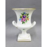 Herend Hungarian porcelain campana vase, painted with flowers to a white ground, on a pedestal