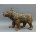 Black Forest style carved wooden bear, 20cm long