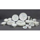 Wedgwood Ice Rose pattern dinner service together with matching cups and saucers, (a lot)