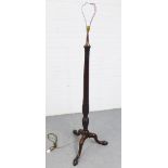 Mahogany standard lamp with leaf carved pattern and tripod legs, 162cm