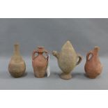 Four Middle Eastern terracotta vases / vessels , tallest 18cm (4)