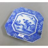 Blue and white chinoiserie plate of octagonal shape, in willow pattern, 26.5cm wide