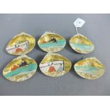 Set of six Japanese handpainted faux ivory mussel shells, with wall hanging loops, 8cm (6)