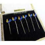 Cased set of six silver and enamel cocktail sticks, stamped Sterling Silver, (6)