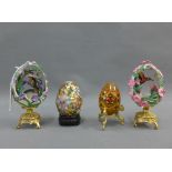 Collection of decorative eggs to include cloisonne, etc, on stands,(a lot)