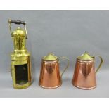 A pair of WAS Benson Patent copper and brass jugs, 14cm high, and a brass lantern case, (3)