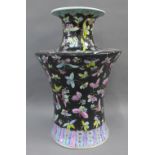 Famille Noir vase with butterfly and flower pattern , 29cm high