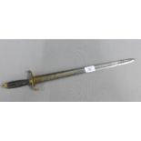 A dagger, the steel blade with gilt motifs and cipher, black celluloid handle and gilt metal finial,