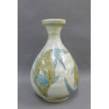Japanese studio pottery vase with fish pattern to a pale blue ground, with impressed signature to