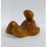 Hand carved abstract treen figure, 14cm long