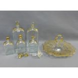 A collection of 19th century gilt glass bottles with stoppers and a similar serving plate, etc,