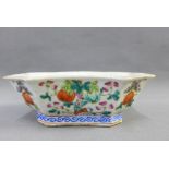 Chinese Famille Rose octagonal dish painted with fruit and a figure, 16cm long