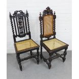 Two Jacobean style dark oak side chairs with carved backs and cane work seats, 114 x 46cm (2)