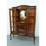 Early 20th century mahogany and inlaid display cabinet, with a central oval mirror flanked by glazed