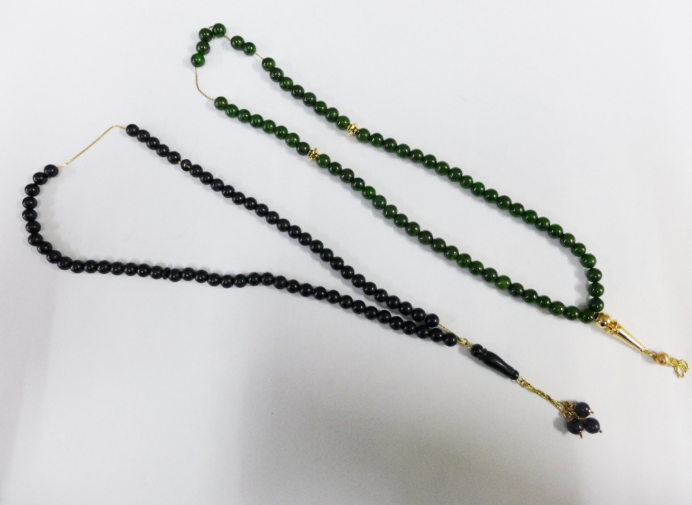 Two sets of Islamic Rosary prayer beads to include black onyx and nephrite with yellow metal spacers