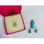 Contemporary silver pendant on chain with matching earrings and another pendant on chain (3)