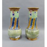 Pair of Royal Doulton pottery vases with art nouveau swirling pattern, 25cm high (2)