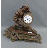 Patinated spelter figural mantle clock, 40cm high