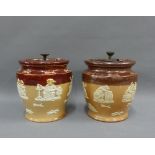 Pair of Royal Doulton tobacco jars, complete with lids, with impressed backstamps, 16cm high (2)