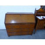 Mahogany and kingwood parquetry inlaid secretaire chest, the fallfront with a fitted interior over
