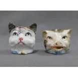 Two 19th century Staffordshire animal head money banks,one of a cat the other of a pig, 5cm high (2)