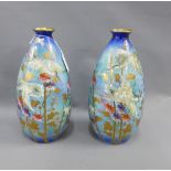 Pair of Tams blue lustre glazed vases with bird and flower pattern with gilt foliage, printed