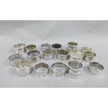 A collection of seventeen napkin rings to include thirteen British silver hallmarked examples, one