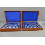 Two mahogany canteens each containing set of twelve Epns fish knives and forks, (a lot)
