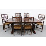 Modern dark oak dining suite comprising a trencher planked top table and set of six chairs, with