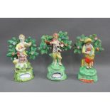 Three Staffordshire boacage figures to include a Gardner, etc, some with losses and restorations,