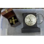 Brass theodolite in a fitted wooden box together with a black slate clock with silvered dial (a/