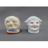 Two 19th century Staffordshire pottery head money banks,one of man the other of a lady in a