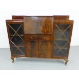 Mahogany secretaire cabinet with central fall front, flanked by glazed cupboard doors, on short