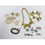 A collection of costume jewellery and shell buckles, etc (a lot)