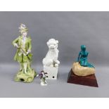Mixed lot to include a white glazed Temple Lion figure, Continental bisque figure, little mermaid